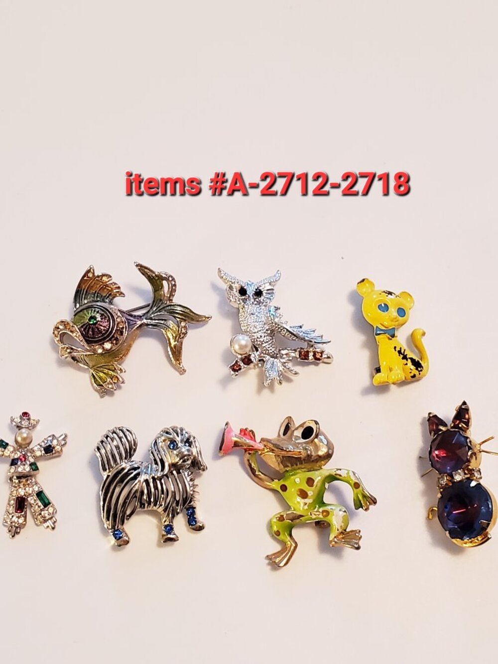 7 Brooches, items # A -2712-2718,.  wt. 60 grams.